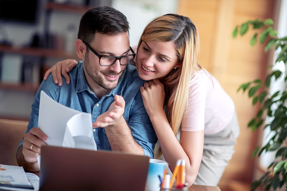 Couple checking their expenses