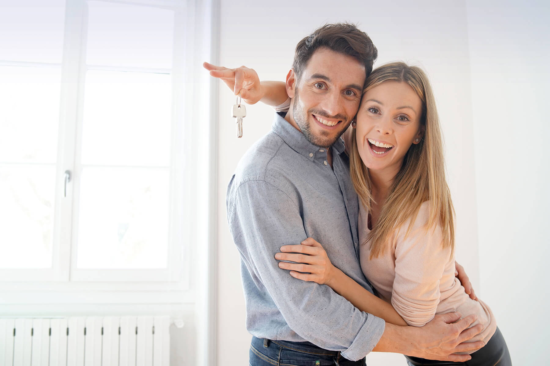 Happy couple with an approved home loan