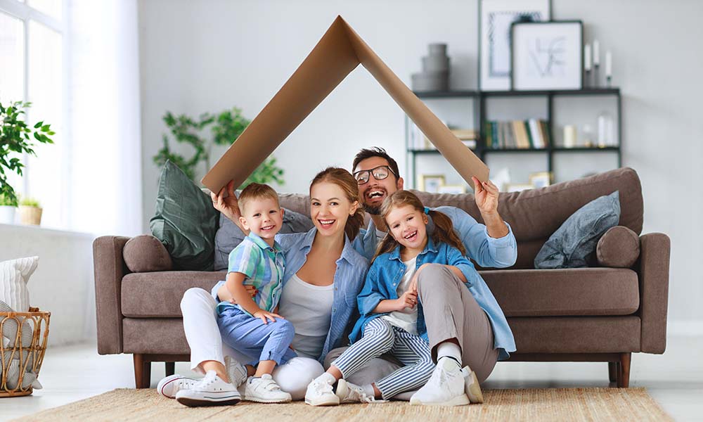Happy family in their newly purchased home