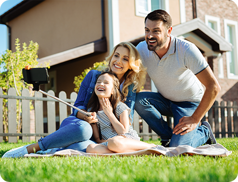 A happy family in their dream home