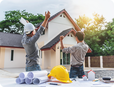 A homeowner and a builder checking a newly built home