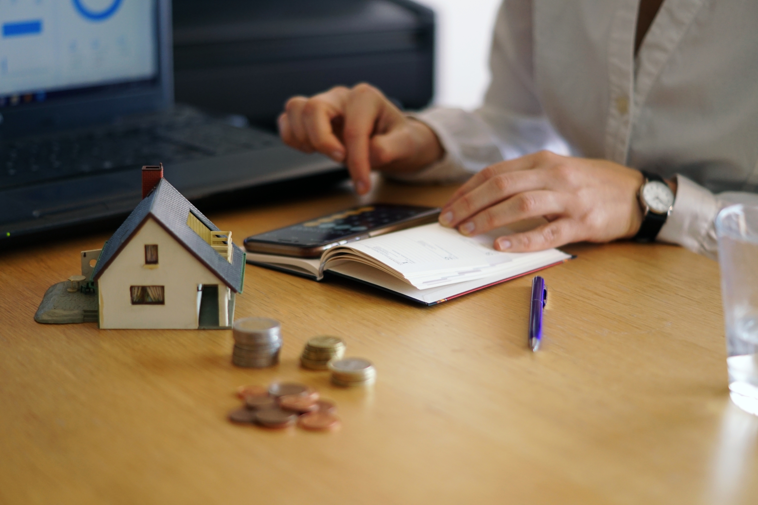 A borrower recomputing home loan repayments
